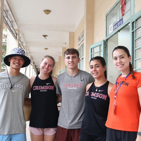 A group of students in Coach for College pose. 